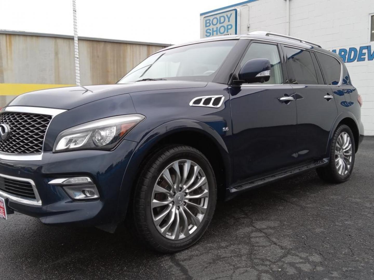 2015 Hermosa Blue /Wheat Infiniti QX80 4WD (JN8AZ2NC6F9) with an 5.6L V8 DOHC 32V engine, 7-Speed Automatic transmission, located at 6064 Gull Rd, Kalamazoo, MI, 49048, (269) 222-0088, 42.328388, -85.512924 - <b>Equipment</b><br>The vehicle's Forward Collision Warning system alerts the driver to potential front-end collisions, enhancing safety. It's AutoCheck: 1 owner, assurance of single-owner history for peace of mind. The state of the art park assist system will guide you easily into any spot. This ve - Photo#2