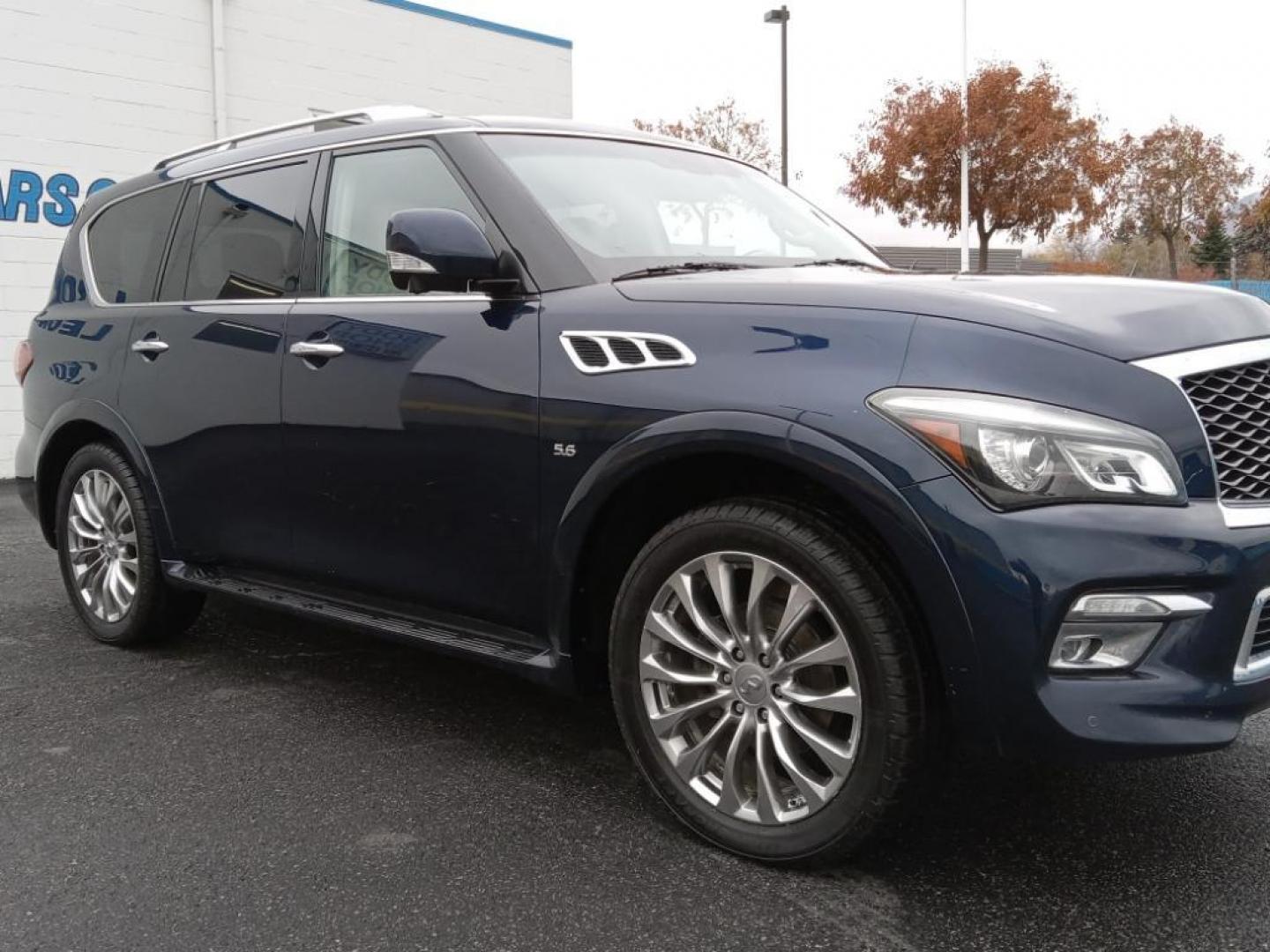 2015 Hermosa Blue /Wheat Infiniti QX80 4WD (JN8AZ2NC6F9) with an 5.6L V8 DOHC 32V engine, 7-Speed Automatic transmission, located at 6064 Gull Rd, Kalamazoo, MI, 49048, (269) 222-0088, 42.328388, -85.512924 - <b>Equipment</b><br>The vehicle's Forward Collision Warning system alerts the driver to potential front-end collisions, enhancing safety. It's AutoCheck: 1 owner, assurance of single-owner history for peace of mind. The state of the art park assist system will guide you easily into any spot. This ve - Photo#4