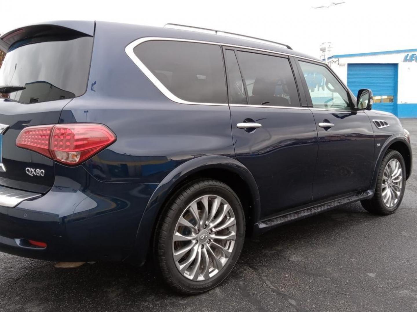 2015 Hermosa Blue /Wheat Infiniti QX80 4WD (JN8AZ2NC6F9) with an 5.6L V8 DOHC 32V engine, 7-Speed Automatic transmission, located at 6064 Gull Rd, Kalamazoo, MI, 49048, (269) 222-0088, 42.328388, -85.512924 - <b>Equipment</b><br>The vehicle's Forward Collision Warning system alerts the driver to potential front-end collisions, enhancing safety. It's AutoCheck: 1 owner, assurance of single-owner history for peace of mind. The state of the art park assist system will guide you easily into any spot. This ve - Photo#5