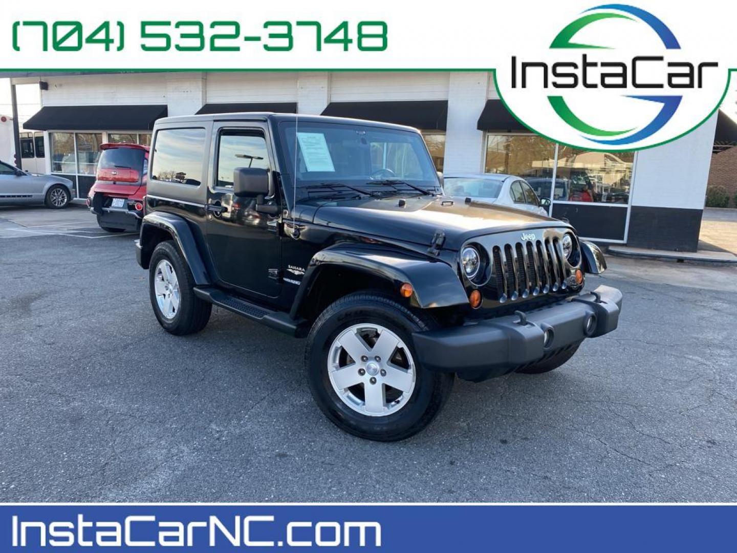 2012 Black Forest Green Pearlcoat /Black Jeep Wrangler Sahara 4WD (1C4AJWBG5CL) with an 3.6L V6 DOHC 24V FFV engine, 5-speed automatic transmission, located at 6064 Gull Rd, Kalamazoo, MI, 49048, (269) 222-0088, 42.328388, -85.512924 - Discover the rugged sophistication of the 2012 Jeep Wrangler Sahara, a versatile SUV that seamlessly blends off-road capability with modern comfort. This pre-owned gem, featuring a robust V6, 3.6L engine, delivers impressive power and performance, making it the perfect companion for both urban commu - Photo#0