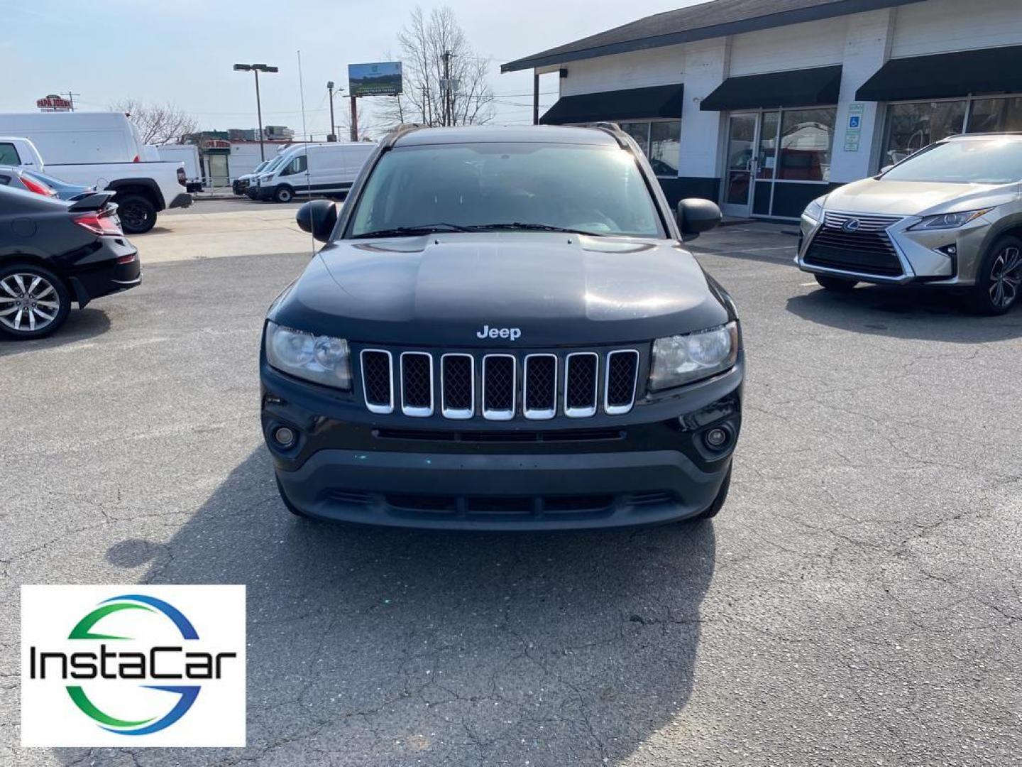 2014 Black Clearcoat /Dark Slate Gray Jeep Compass Sport FWD (1C4NJCBA9ED) with an 2.0L L4 DOHC 16V engine, 5-speed manual transmission, located at 6064 Gull Rd, Kalamazoo, MI, 49048, (269) 222-0088, 42.328388, -85.512924 - Introducing the impeccable 2014 Jeep Compass Sport, now available at our esteemed dealership. This used gem has been meticulously maintained and is ready to embark on its next adventure with you. With a remarkable mileage of 179,461 miles, this SUV has proven its reliability and longevity, making it - Photo#8