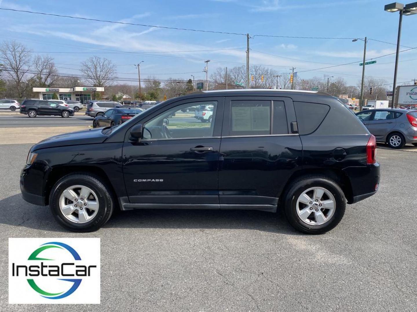 2014 Black Clearcoat /Dark Slate Gray Jeep Compass Sport FWD (1C4NJCBA9ED) with an 2.0L L4 DOHC 16V engine, 5-speed manual transmission, located at 6064 Gull Rd, Kalamazoo, MI, 49048, (269) 222-0088, 42.328388, -85.512924 - Introducing the impeccable 2014 Jeep Compass Sport, now available at our esteemed dealership. This used gem has been meticulously maintained and is ready to embark on its next adventure with you. With a remarkable mileage of 179,461 miles, this SUV has proven its reliability and longevity, making it - Photo#10