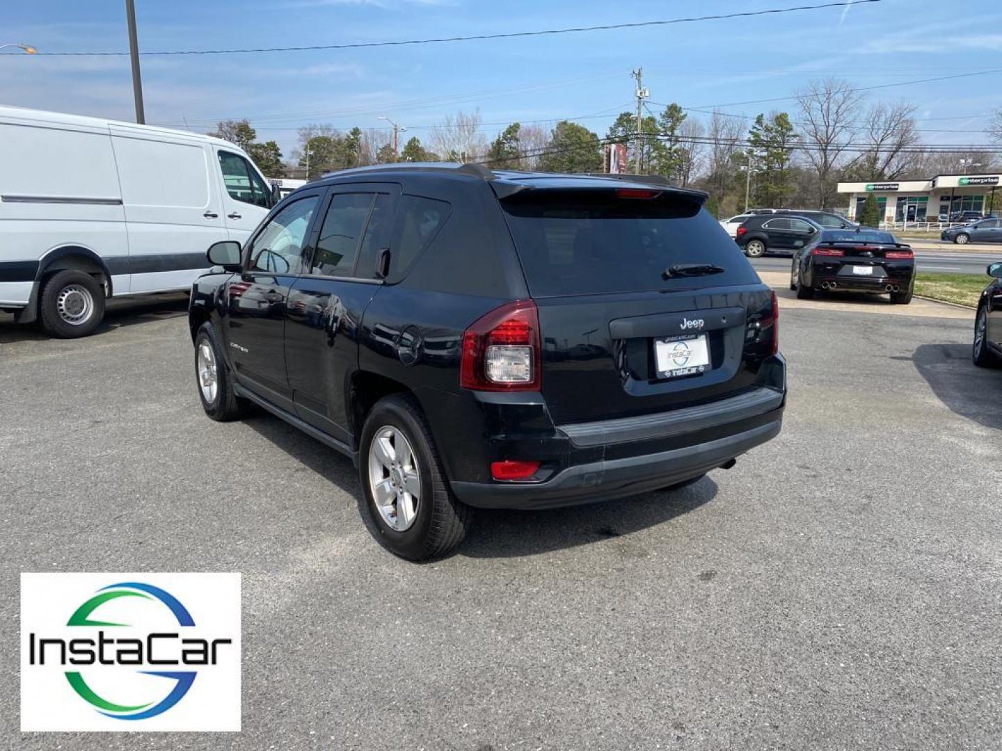 2014 Black Clearcoat /Dark Slate Gray Jeep Compass Sport FWD (1C4NJCBA9ED) with an 2.0L L4 DOHC 16V engine, 5-speed manual transmission, located at 6064 Gull Rd, Kalamazoo, MI, 49048, (269) 222-0088, 42.328388, -85.512924 - Introducing the impeccable 2014 Jeep Compass Sport, now available at our esteemed dealership. This used gem has been meticulously maintained and is ready to embark on its next adventure with you. With a remarkable mileage of 179,461 miles, this SUV has proven its reliability and longevity, making it - Photo#11