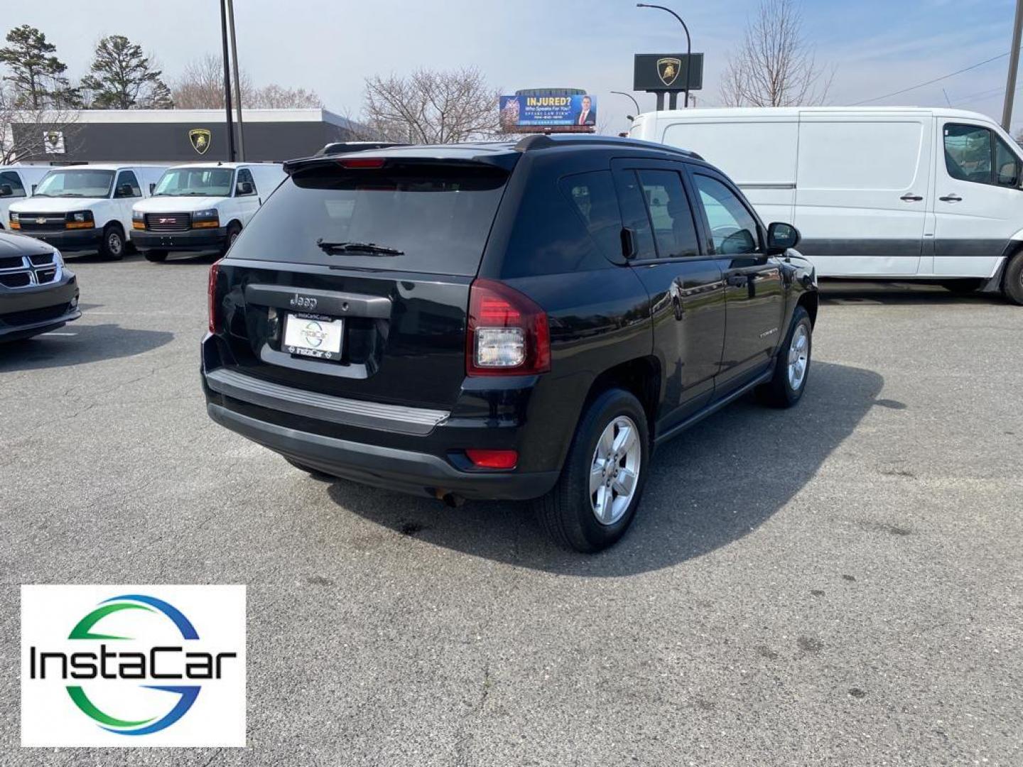 2014 Black Clearcoat /Dark Slate Gray Jeep Compass Sport FWD (1C4NJCBA9ED) with an 2.0L L4 DOHC 16V engine, 5-speed manual transmission, located at 6064 Gull Rd, Kalamazoo, MI, 49048, (269) 222-0088, 42.328388, -85.512924 - Introducing the impeccable 2014 Jeep Compass Sport, now available at our esteemed dealership. This used gem has been meticulously maintained and is ready to embark on its next adventure with you. With a remarkable mileage of 179,461 miles, this SUV has proven its reliability and longevity, making it - Photo#13