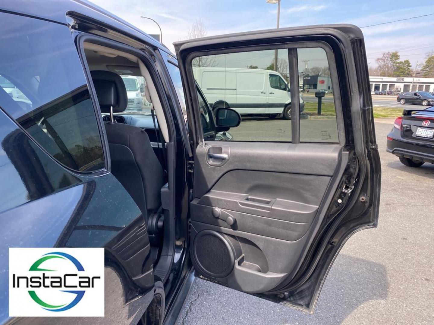 2014 Black Clearcoat /Dark Slate Gray Jeep Compass Sport FWD (1C4NJCBA9ED) with an 2.0L L4 DOHC 16V engine, 5-speed manual transmission, located at 6064 Gull Rd, Kalamazoo, MI, 49048, (269) 222-0088, 42.328388, -85.512924 - Introducing the impeccable 2014 Jeep Compass Sport, now available at our esteemed dealership. This used gem has been meticulously maintained and is ready to embark on its next adventure with you. With a remarkable mileage of 179,461 miles, this SUV has proven its reliability and longevity, making it - Photo#21