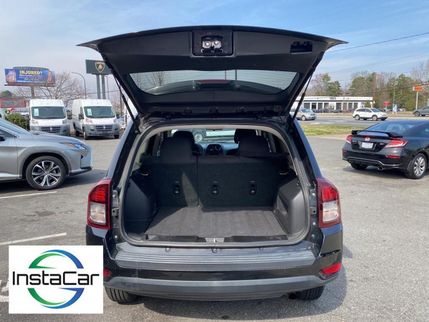 2014 Black Clearcoat /Dark Slate Gray Jeep Compass Sport FWD (1C4NJCBA9ED) with an 2.0L L4 DOHC 16V engine, 5-speed manual transmission, located at 6064 Gull Rd, Kalamazoo, MI, 49048, (269) 222-0088, 42.328388, -85.512924 - Introducing the impeccable 2014 Jeep Compass Sport, now available at our esteemed dealership. This used gem has been meticulously maintained and is ready to embark on its next adventure with you. With a remarkable mileage of 179,461 miles, this SUV has proven its reliability and longevity, making it - Photo#27