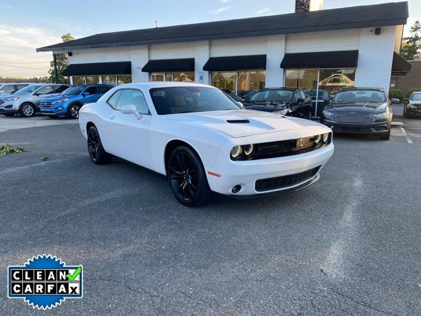 2016 WHITE Dodge Challenger SXT (2C3CDZAG5GH) with an 3.6L V6 DOHC 24V engine, 5A transmission, located at 6064 Gull Rd, Kalamazoo, MI, 49048, (269) 222-0088, 42.328388, -85.512924 - <b>Equipment</b><br>Protect this 2016 Dodge Challenger from unwanted accidents with a cutting edge backup camera system. This unit features a hands-free Bluetooth phone system. The satellite radio system in this mid-size car gives you access to hundreds of nation-wide radio stations with a clear di - Photo#7