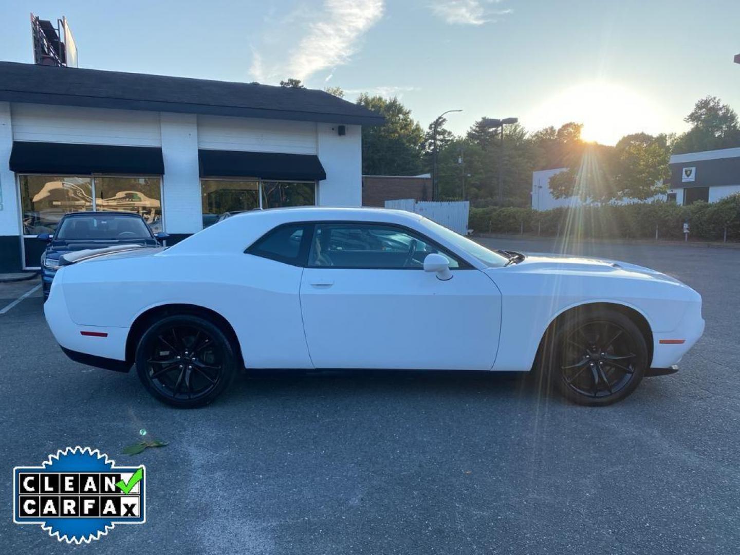 2016 WHITE Dodge Challenger SXT (2C3CDZAG5GH) with an 3.6L V6 DOHC 24V engine, 5A transmission, located at 6064 Gull Rd, Kalamazoo, MI, 49048, (269) 222-0088, 42.328388, -85.512924 - <b>Equipment</b><br>Protect this 2016 Dodge Challenger from unwanted accidents with a cutting edge backup camera system. This unit features a hands-free Bluetooth phone system. The satellite radio system in this mid-size car gives you access to hundreds of nation-wide radio stations with a clear di - Photo#14