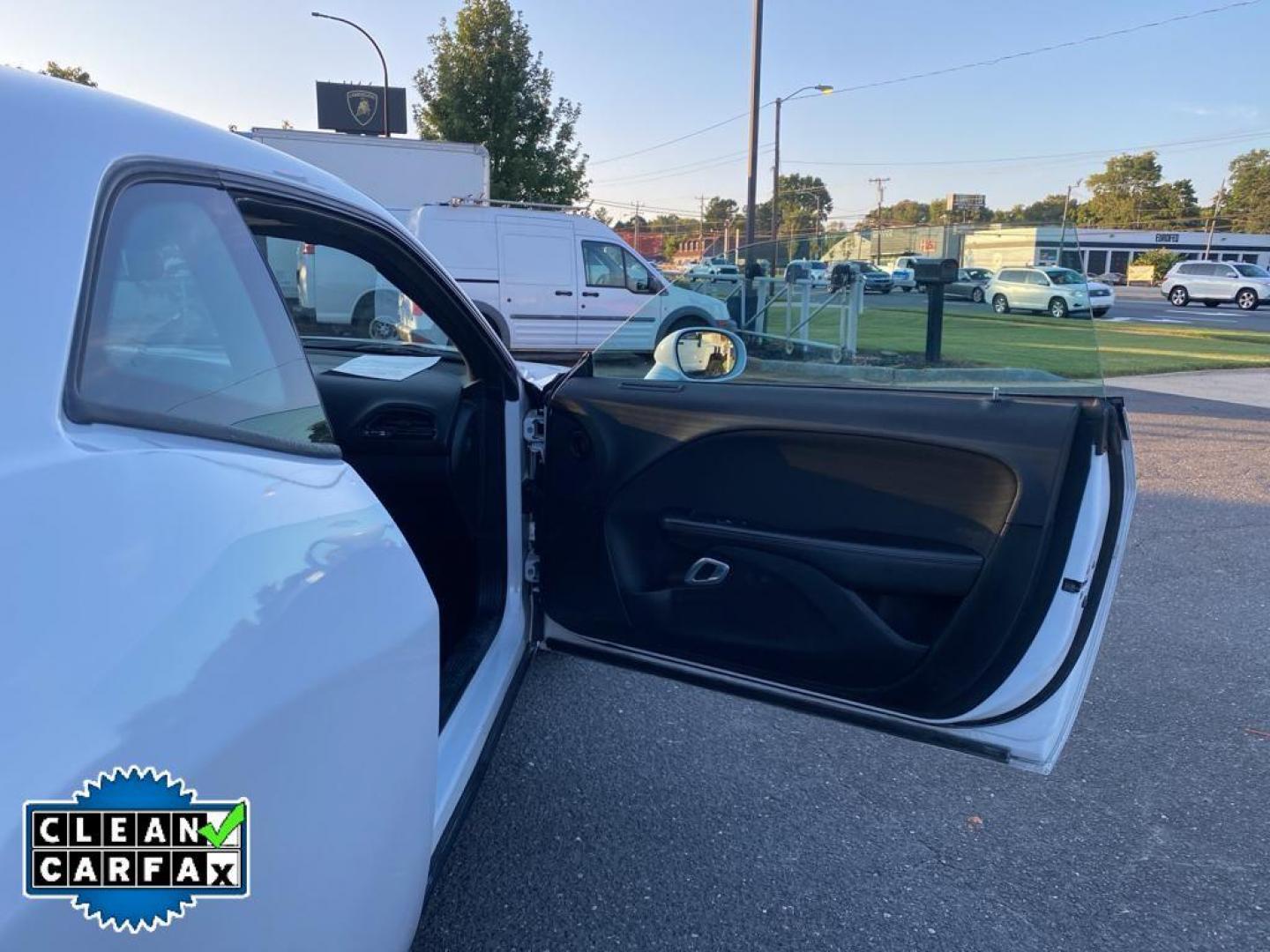 2016 WHITE Dodge Challenger SXT (2C3CDZAG5GH) with an 3.6L V6 DOHC 24V engine, 5A transmission, located at 6064 Gull Rd, Kalamazoo, MI, 49048, (269) 222-0088, 42.328388, -85.512924 - <b>Equipment</b><br>Protect this 2016 Dodge Challenger from unwanted accidents with a cutting edge backup camera system. This unit features a hands-free Bluetooth phone system. The satellite radio system in this mid-size car gives you access to hundreds of nation-wide radio stations with a clear di - Photo#21