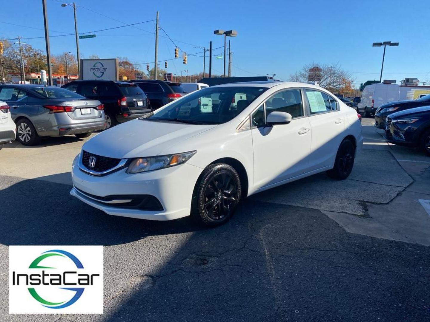 2014 Taffeta White /Beige Honda Civic EX Sedan CVT (19XFB2F86EE) with an 1.8L L4 SOHC 16V engine, Continuously Variable Transmission transmission, located at 6064 Gull Rd, Kalamazoo, MI, 49048, (269) 222-0088, 42.328388, -85.512924 - Protect this unit from unwanted accidents with a cutting edge backup camera system. This unit offers Automatic Climate Control for personalized comfort. Bluetooth technology is built into the Honda Civic, keeping your hands on the steering wheel and your focus on the road. The vehicle is front wheel - Photo#10