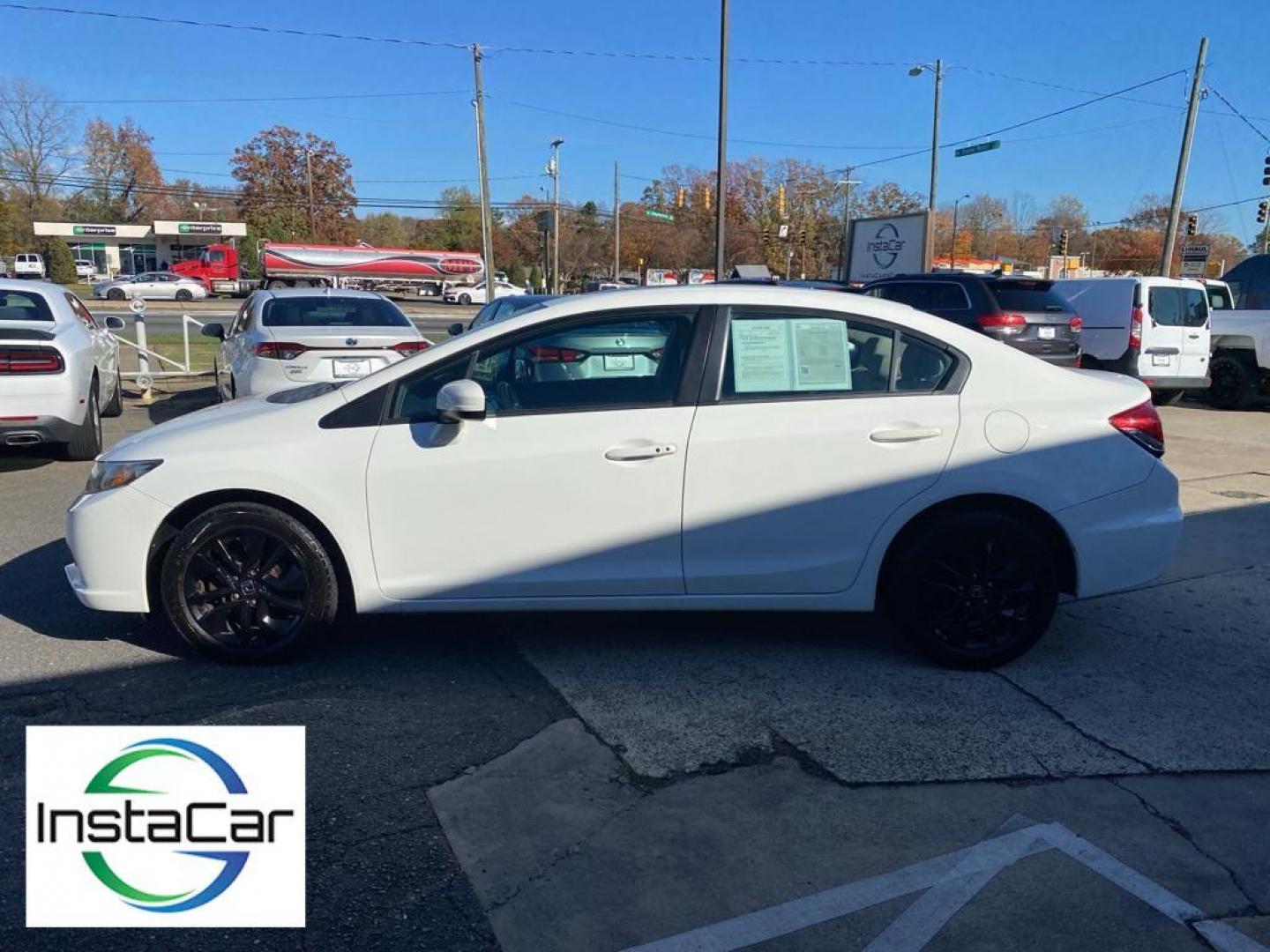 2014 Taffeta White /Beige Honda Civic EX Sedan CVT (19XFB2F86EE) with an 1.8L L4 SOHC 16V engine, Continuously Variable Transmission transmission, located at 6064 Gull Rd, Kalamazoo, MI, 49048, (269) 222-0088, 42.328388, -85.512924 - Protect this unit from unwanted accidents with a cutting edge backup camera system. This unit offers Automatic Climate Control for personalized comfort. Bluetooth technology is built into the Honda Civic, keeping your hands on the steering wheel and your focus on the road. The vehicle is front wheel - Photo#11