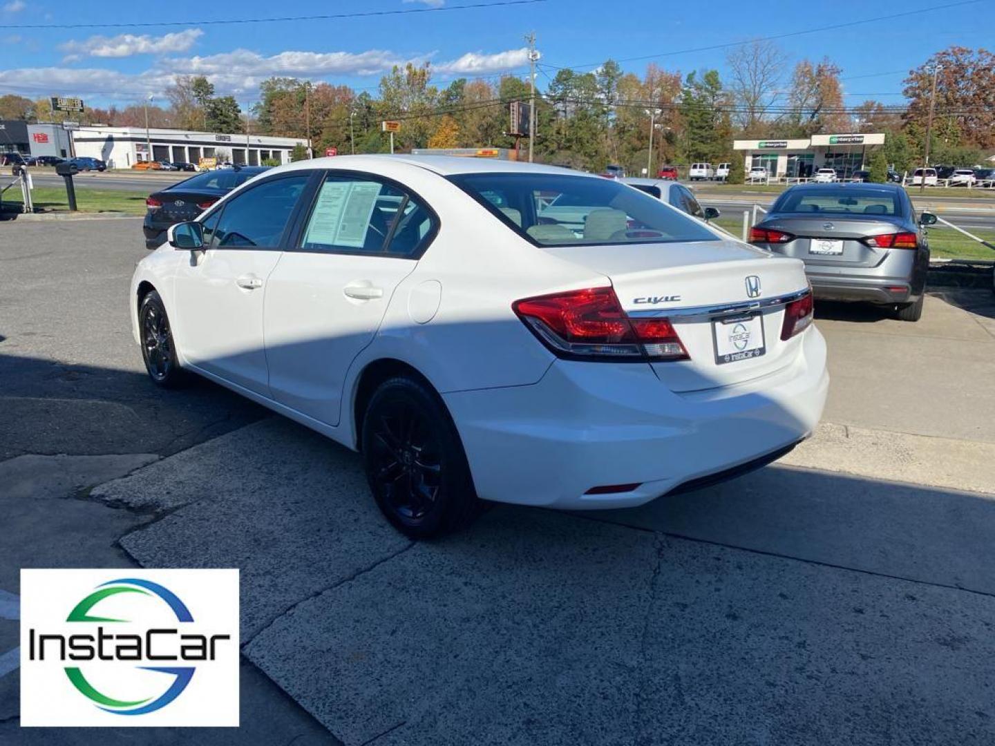 2014 Taffeta White /Beige Honda Civic EX Sedan CVT (19XFB2F86EE) with an 1.8L L4 SOHC 16V engine, Continuously Variable Transmission transmission, located at 6064 Gull Rd, Kalamazoo, MI, 49048, (269) 222-0088, 42.328388, -85.512924 - Protect this unit from unwanted accidents with a cutting edge backup camera system. This unit offers Automatic Climate Control for personalized comfort. Bluetooth technology is built into the Honda Civic, keeping your hands on the steering wheel and your focus on the road. The vehicle is front wheel - Photo#12