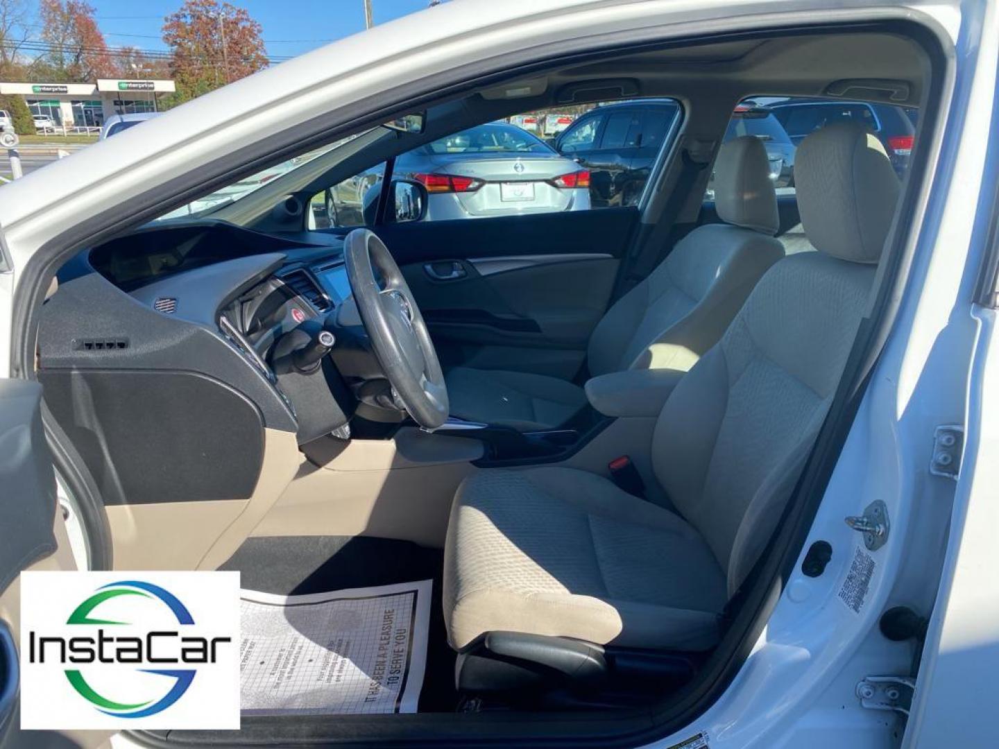 2014 Taffeta White /Beige Honda Civic EX Sedan CVT (19XFB2F86EE) with an 1.8L L4 SOHC 16V engine, Continuously Variable Transmission transmission, located at 6064 Gull Rd, Kalamazoo, MI, 49048, (269) 222-0088, 42.328388, -85.512924 - Protect this unit from unwanted accidents with a cutting edge backup camera system. This unit offers Automatic Climate Control for personalized comfort. Bluetooth technology is built into the Honda Civic, keeping your hands on the steering wheel and your focus on the road. The vehicle is front wheel - Photo#25