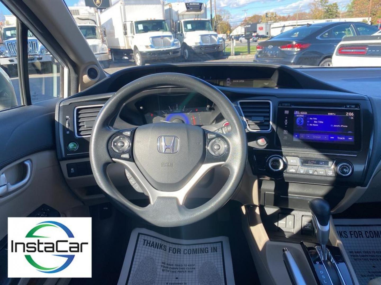 2014 Taffeta White /Beige Honda Civic EX Sedan CVT (19XFB2F86EE) with an 1.8L L4 SOHC 16V engine, Continuously Variable Transmission transmission, located at 6064 Gull Rd, Kalamazoo, MI, 49048, (269) 222-0088, 42.328388, -85.512924 - Protect this unit from unwanted accidents with a cutting edge backup camera system. This unit offers Automatic Climate Control for personalized comfort. Bluetooth technology is built into the Honda Civic, keeping your hands on the steering wheel and your focus on the road. The vehicle is front wheel - Photo#30