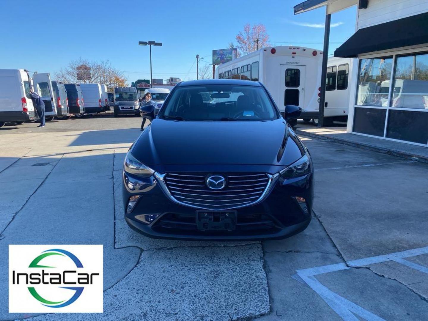 2017 Deep Crystal Blue Mica /Black Mazda CX-3 Grand Touring AWD (JM1DKFD77H0) with an 2.0L L4 DOHC 16V engine, 6A transmission, located at 6064 Gull Rd, Kalamazoo, MI, 49048, (269) 222-0088, 42.328388, -85.512924 - <b>Equipment</b><br>You'll never again be lost in a crowded city or a country region with the navigation system on this small suv. This unit has satellite radio capabilities. Engulf yourself with the crystal clear sound of a BOSE sound system in the vehicle. Bluetooth technology is built into this - Photo#8