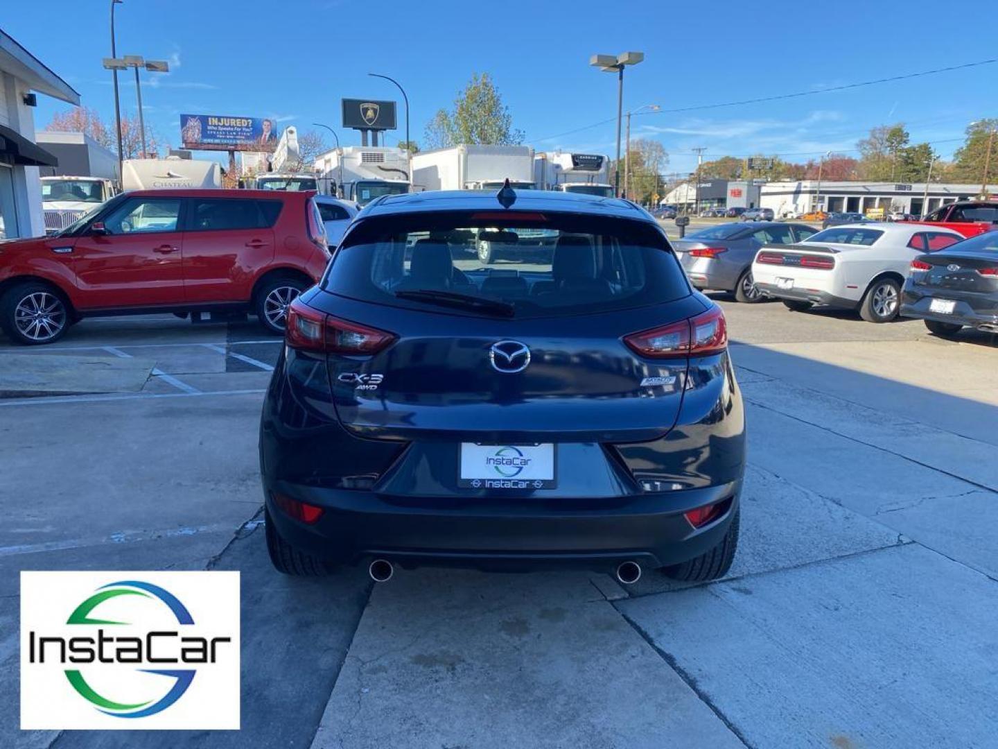 2017 Deep Crystal Blue Mica /Black Mazda CX-3 Grand Touring AWD (JM1DKFD77H0) with an 2.0L L4 DOHC 16V engine, 6A transmission, located at 6064 Gull Rd, Kalamazoo, MI, 49048, (269) 222-0088, 42.328388, -85.512924 - <b>Equipment</b><br>You'll never again be lost in a crowded city or a country region with the navigation system on this small suv. This unit has satellite radio capabilities. Engulf yourself with the crystal clear sound of a BOSE sound system in the vehicle. Bluetooth technology is built into this - Photo#12