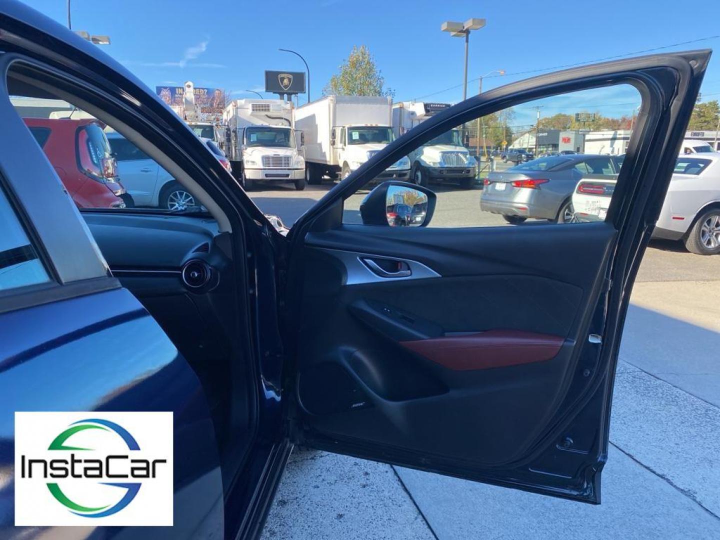 2017 Deep Crystal Blue Mica /Black Mazda CX-3 Grand Touring AWD (JM1DKFD77H0) with an 2.0L L4 DOHC 16V engine, 6A transmission, located at 6064 Gull Rd, Kalamazoo, MI, 49048, (269) 222-0088, 42.328388, -85.512924 - <b>Equipment</b><br>You'll never again be lost in a crowded city or a country region with the navigation system on this small suv. This unit has satellite radio capabilities. Engulf yourself with the crystal clear sound of a BOSE sound system in the vehicle. Bluetooth technology is built into this - Photo#23