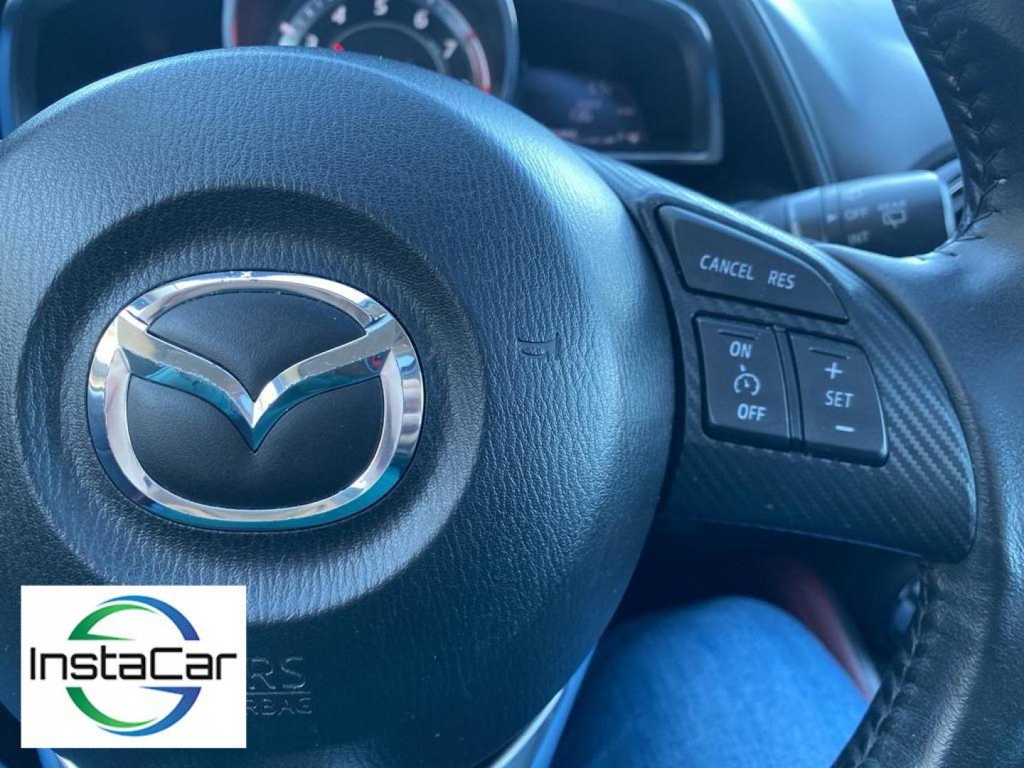 2017 Deep Crystal Blue Mica /Black Mazda CX-3 Grand Touring AWD (JM1DKFD77H0) with an 2.0L L4 DOHC 16V engine, 6A transmission, located at 6064 Gull Rd, Kalamazoo, MI, 49048, (269) 222-0088, 42.328388, -85.512924 - <b>Equipment</b><br>You'll never again be lost in a crowded city or a country region with the navigation system on this small suv. This unit has satellite radio capabilities. Engulf yourself with the crystal clear sound of a BOSE sound system in the vehicle. Bluetooth technology is built into this - Photo#31