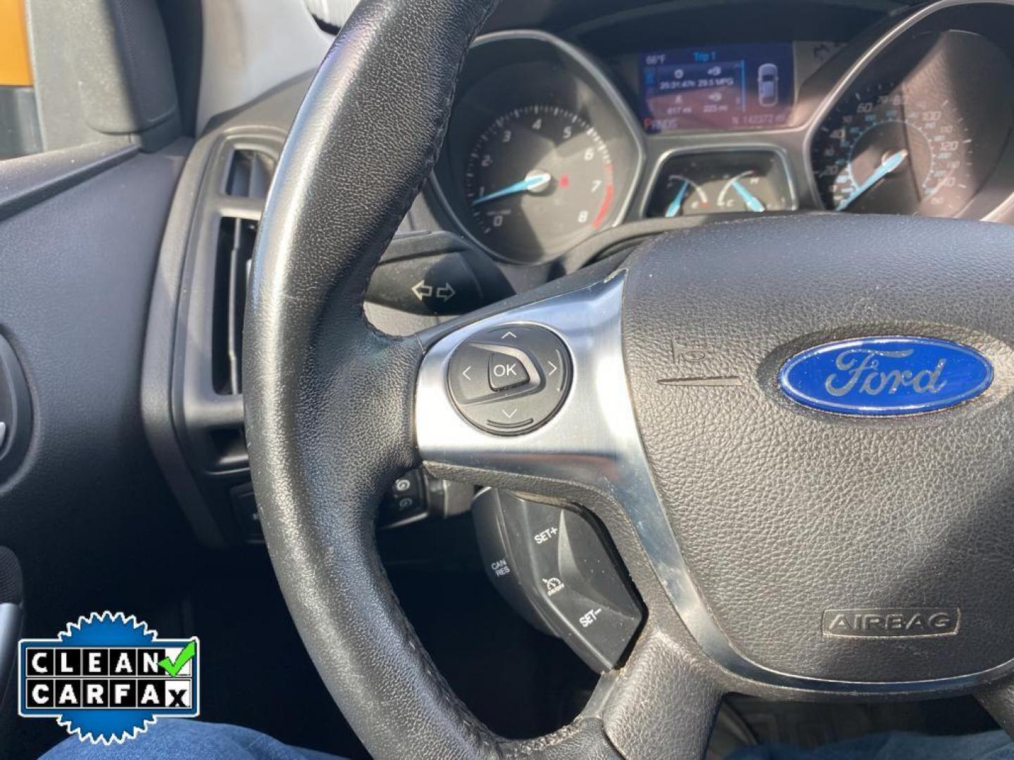 2012 Yellow Blaze Metallic Tri-coat /Charcoal Black w/Metal Gray Surround Ford Focus SE (1FAHP3K27CL) with an 2.0L L4 DOHC 16V engine, 6-speed auto-shift manual transmission, located at 6064 Gull Rd, Kalamazoo, MI, 49048, (269) 222-0088, 42.328388, -85.512924 - For sale at our dealership is a well-maintained 2012 Ford Focus SE, perfect for those seeking a reliable and efficient vehicle. This compact sedan is equipped with a fuel-efficient 4-cylinder, 2.0L engine, providing a smooth and responsive driving experience. With front-wheel drive, the Focus SE off - Photo#2