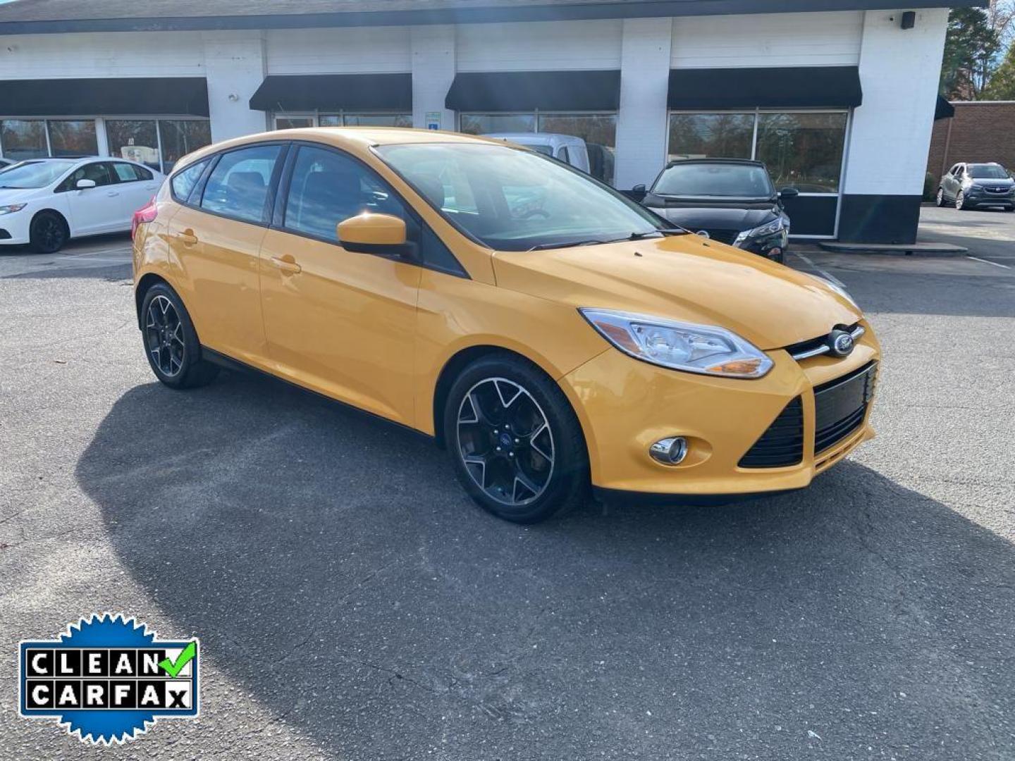 2012 Yellow Blaze Metallic Tri-coat /Charcoal Black w/Metal Gray Surround Ford Focus SE (1FAHP3K27CL) with an 2.0L L4 DOHC 16V engine, 6-speed auto-shift manual transmission, located at 6064 Gull Rd, Kalamazoo, MI, 49048, (269) 222-0088, 42.328388, -85.512924 - For sale at our dealership is a well-maintained 2012 Ford Focus SE, perfect for those seeking a reliable and efficient vehicle. This compact sedan is equipped with a fuel-efficient 4-cylinder, 2.0L engine, providing a smooth and responsive driving experience. With front-wheel drive, the Focus SE off - Photo#6