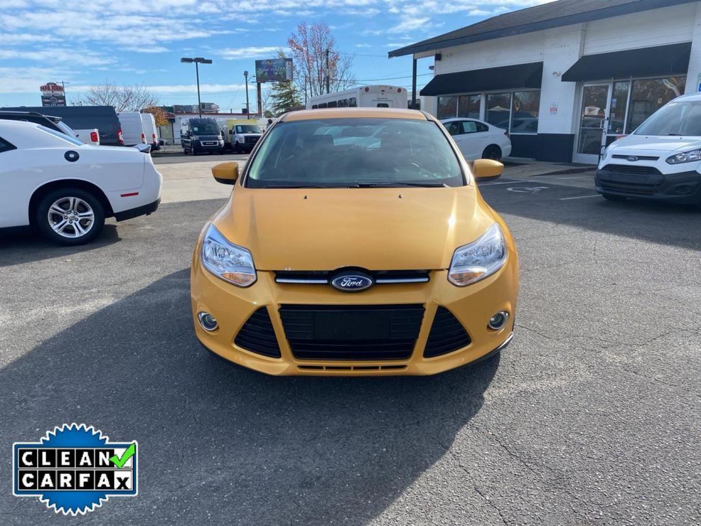 2012 Yellow Blaze Metallic Tri-coat /Charcoal Black w/Metal Gray Surround Ford Focus SE (1FAHP3K27CL) with an 2.0L L4 DOHC 16V engine, 6-speed auto-shift manual transmission, located at 6064 Gull Rd, Kalamazoo, MI, 49048, (269) 222-0088, 42.328388, -85.512924 - For sale at our dealership is a well-maintained 2012 Ford Focus SE, perfect for those seeking a reliable and efficient vehicle. This compact sedan is equipped with a fuel-efficient 4-cylinder, 2.0L engine, providing a smooth and responsive driving experience. With front-wheel drive, the Focus SE off - Photo#7