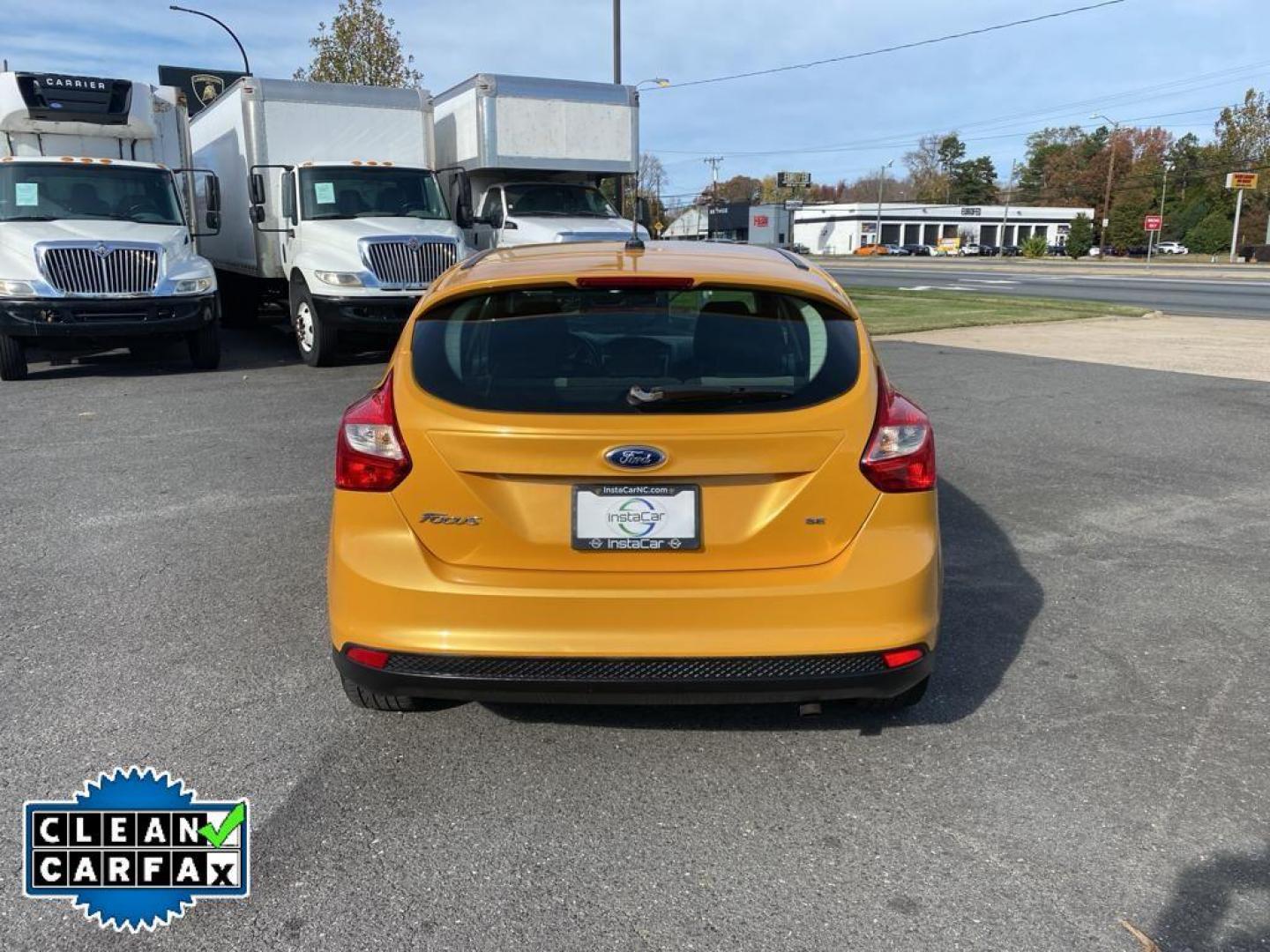 2012 Yellow Blaze Metallic Tri-coat /Charcoal Black w/Metal Gray Surround Ford Focus SE (1FAHP3K27CL) with an 2.0L L4 DOHC 16V engine, 6-speed auto-shift manual transmission, located at 6064 Gull Rd, Kalamazoo, MI, 49048, (269) 222-0088, 42.328388, -85.512924 - For sale at our dealership is a well-maintained 2012 Ford Focus SE, perfect for those seeking a reliable and efficient vehicle. This compact sedan is equipped with a fuel-efficient 4-cylinder, 2.0L engine, providing a smooth and responsive driving experience. With front-wheel drive, the Focus SE off - Photo#11