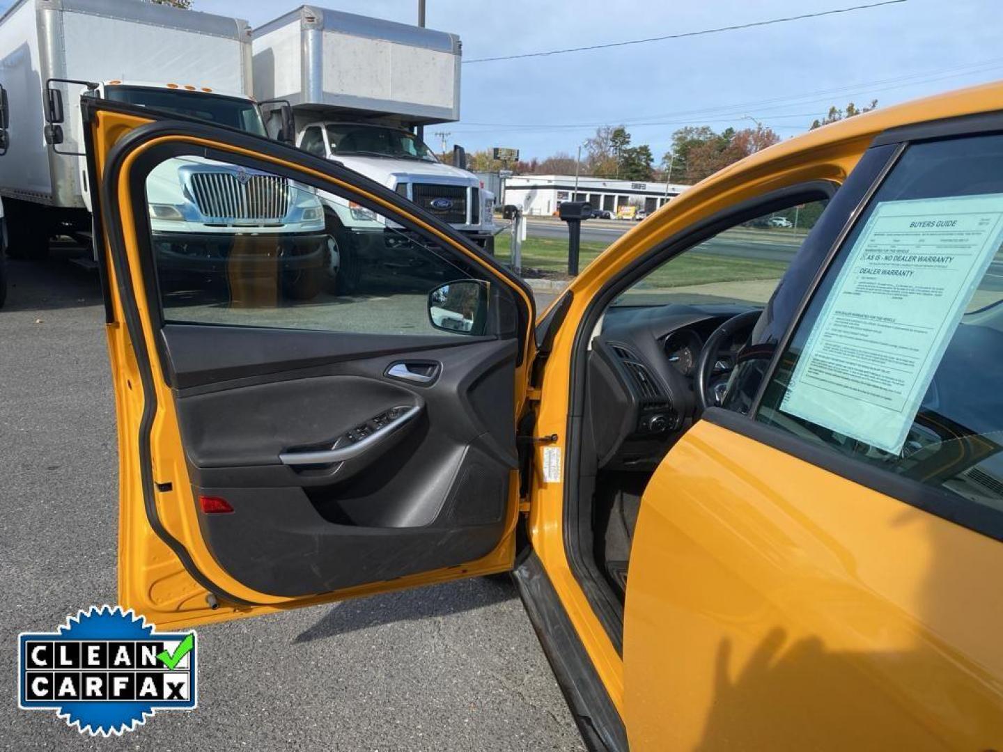 2012 Yellow Blaze Metallic Tri-coat /Charcoal Black w/Metal Gray Surround Ford Focus SE (1FAHP3K27CL) with an 2.0L L4 DOHC 16V engine, 6-speed auto-shift manual transmission, located at 6064 Gull Rd, Kalamazoo, MI, 49048, (269) 222-0088, 42.328388, -85.512924 - For sale at our dealership is a well-maintained 2012 Ford Focus SE, perfect for those seeking a reliable and efficient vehicle. This compact sedan is equipped with a fuel-efficient 4-cylinder, 2.0L engine, providing a smooth and responsive driving experience. With front-wheel drive, the Focus SE off - Photo#18