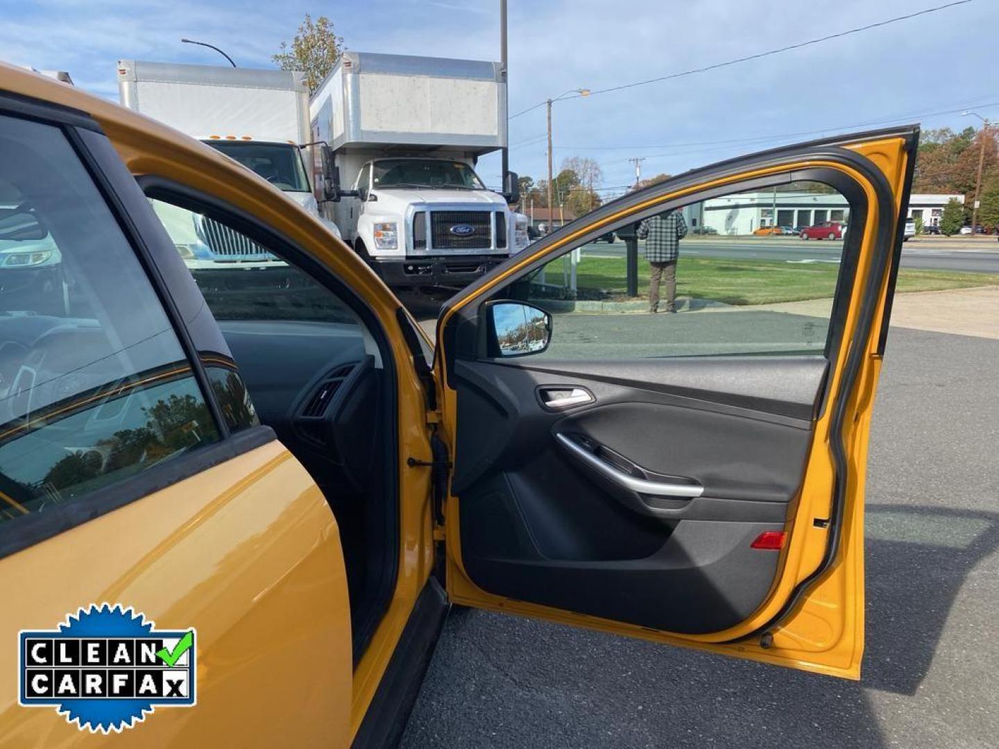 2012 Yellow Blaze Metallic Tri-coat /Charcoal Black w/Metal Gray Surround Ford Focus SE (1FAHP3K27CL) with an 2.0L L4 DOHC 16V engine, 6-speed auto-shift manual transmission, located at 6064 Gull Rd, Kalamazoo, MI, 49048, (269) 222-0088, 42.328388, -85.512924 - For sale at our dealership is a well-maintained 2012 Ford Focus SE, perfect for those seeking a reliable and efficient vehicle. This compact sedan is equipped with a fuel-efficient 4-cylinder, 2.0L engine, providing a smooth and responsive driving experience. With front-wheel drive, the Focus SE off - Photo#22