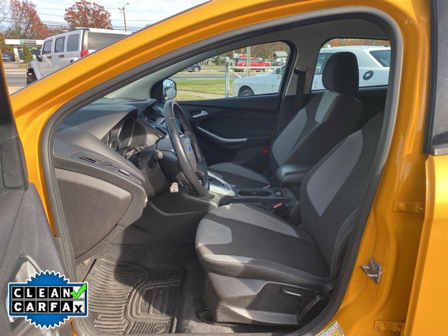 2012 Yellow Blaze Metallic Tri-coat /Charcoal Black w/Metal Gray Surround Ford Focus SE (1FAHP3K27CL) with an 2.0L L4 DOHC 16V engine, 6-speed auto-shift manual transmission, located at 6064 Gull Rd, Kalamazoo, MI, 49048, (269) 222-0088, 42.328388, -85.512924 - For sale at our dealership is a well-maintained 2012 Ford Focus SE, perfect for those seeking a reliable and efficient vehicle. This compact sedan is equipped with a fuel-efficient 4-cylinder, 2.0L engine, providing a smooth and responsive driving experience. With front-wheel drive, the Focus SE off - Photo#23