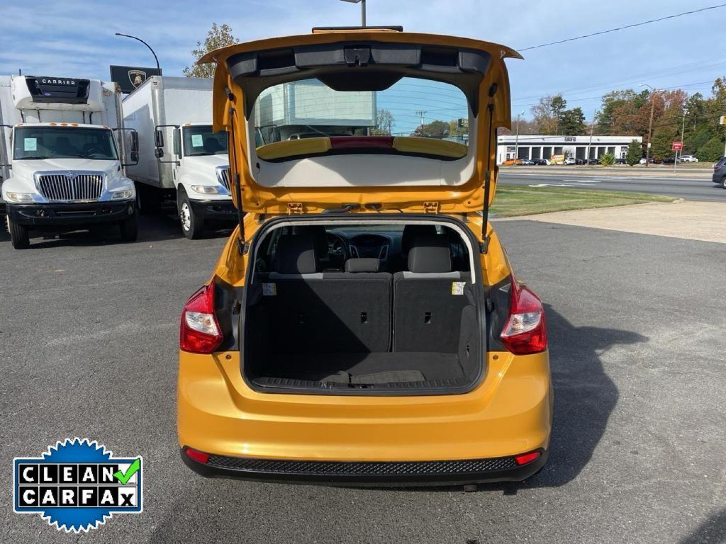 2012 Yellow Blaze Metallic Tri-coat /Charcoal Black w/Metal Gray Surround Ford Focus SE (1FAHP3K27CL) with an 2.0L L4 DOHC 16V engine, 6-speed auto-shift manual transmission, located at 6064 Gull Rd, Kalamazoo, MI, 49048, (269) 222-0088, 42.328388, -85.512924 - For sale at our dealership is a well-maintained 2012 Ford Focus SE, perfect for those seeking a reliable and efficient vehicle. This compact sedan is equipped with a fuel-efficient 4-cylinder, 2.0L engine, providing a smooth and responsive driving experience. With front-wheel drive, the Focus SE off - Photo#29