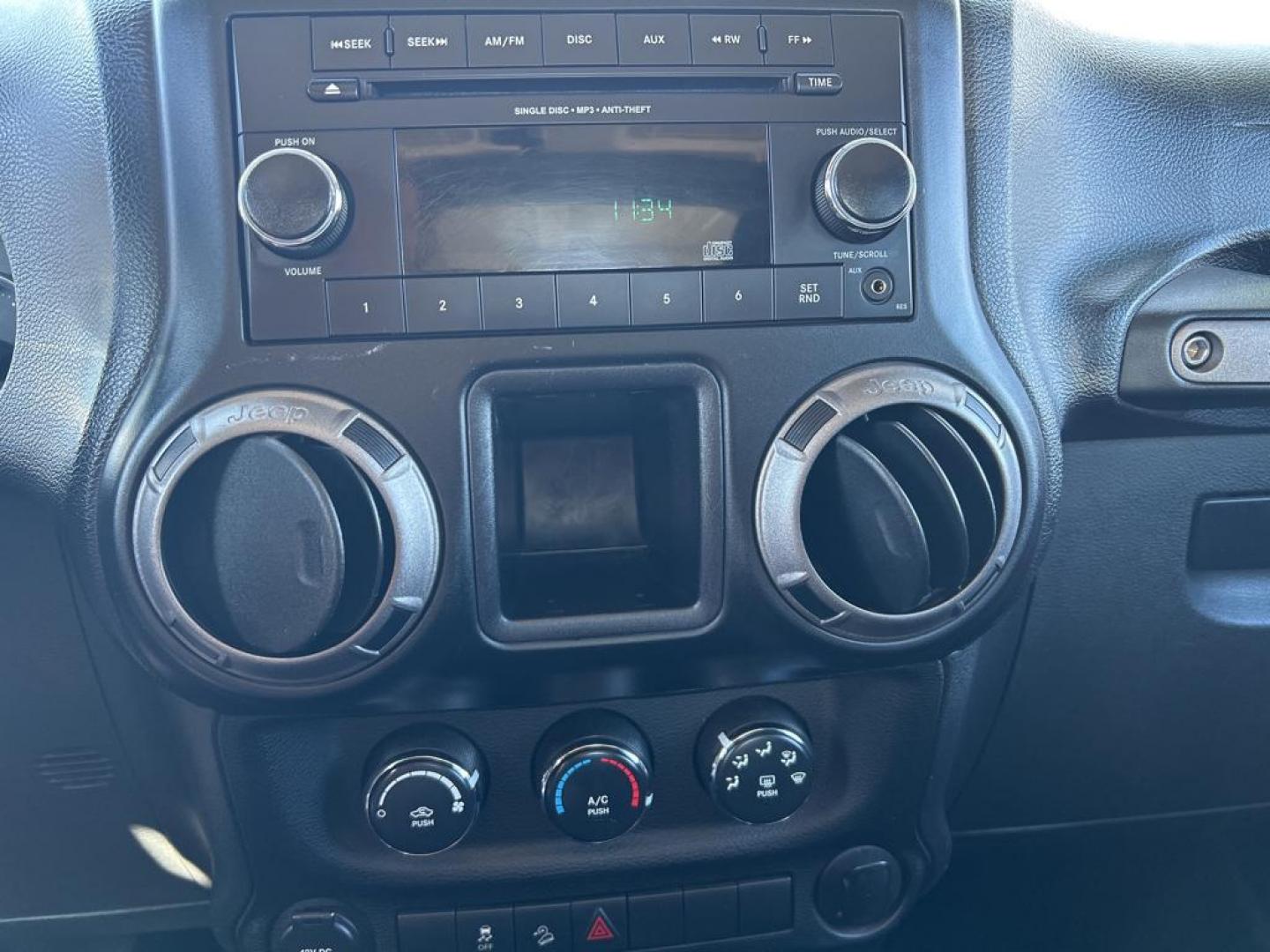 2012 orange Jeep Wrangler Sport 4WD (1C4AJWAG7CL) with an 3.6L V6 DOHC 24V FFV engine, Automatic transmission, located at 6064 Gull Rd, Kalamazoo, MI, 49048, (269) 222-0088, 42.328388, -85.512924 - Photo#12