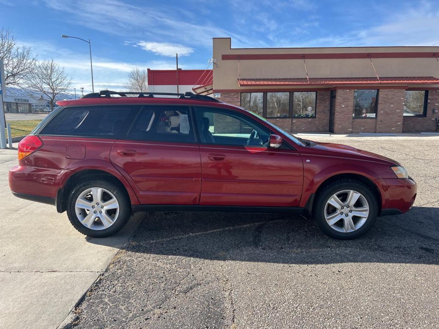 2006 maroon Subaru Outback 2.5XT Limited Wagon (4S4BP67C866) with an 2.5L H4 DOHC 16V TURBO engine, 5-Speed Automatic Overdrive transmission, located at 6064 Gull Rd, Kalamazoo, MI, 49048, (269) 222-0088, 42.328388, -85.512924 - Photo#4