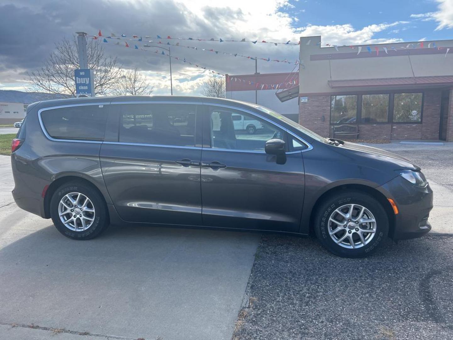 2022 Chrysler Voyager LX (2C4RC1CG9NR) with an 3.6L V6 DOHC 24V engine, 9A transmission, located at 6064 Gull Rd, Kalamazoo, MI, 49048, (269) 222-0088, 42.328388, -85.512924 - Introducing the 2022 Chrysler Voyager LX, a dynamic blend of sophistication and practicality that's ready to elevate your driving experience! Powered by a robust V6, 3.6L engine, this front-wheel-drive marvel offers an exhilarating blend of power and efficiency, making every journey a joy.<br> - Photo#4